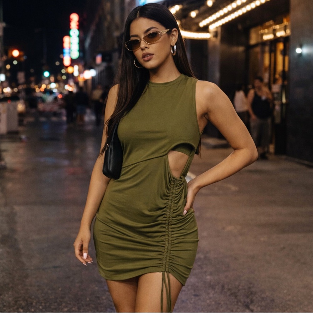Army green stretch bodycon mini dress with cutout in bodice and drawstring hem
